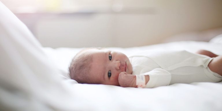 Newborn baby grows dense thick hair all over her body