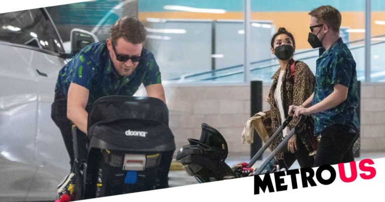 Macaulay Culkin and baby son Dakota match shoes on family shopping trip