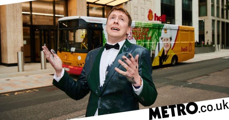 Joe Lycett doused in ‘oil’ as he stages stunt outside Shell’s HQ