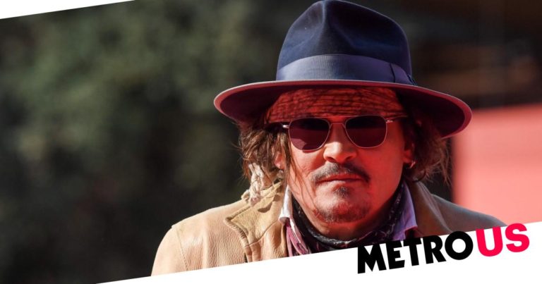 Johnny Depp channels Captain Jack Sparrow as he hits Rome Film Festival
