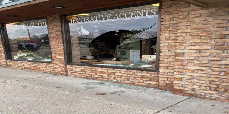 Deer bursts through a store window in Michigan