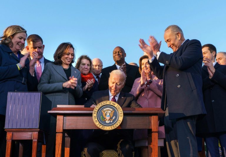 Joe Biden celebrates rare win with US infrastructure bill signing