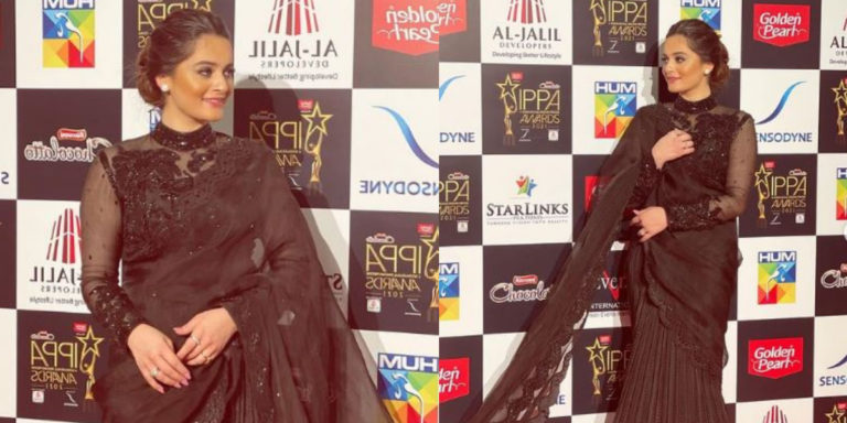 Aiman Khan looks ethereal in a stunning black saree with a sheer blouse