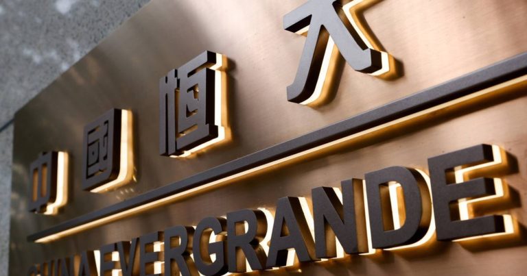 Evergrande says 57,400 properties delivered to buyers