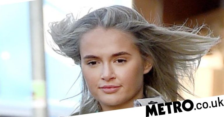 Molly-Mae Hague reveals lump removal scar as she relaxes on beach