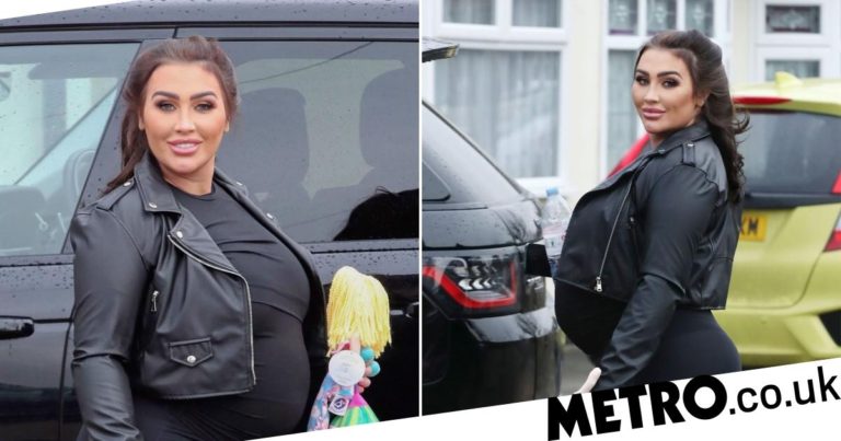 Lauren Goodger steps out with bump on show for first time