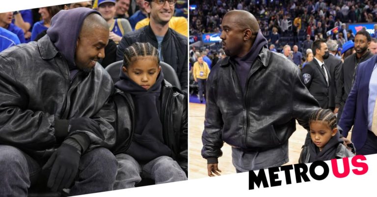 Kanye West smiles at NBA game with son Saint after Instagram suspension