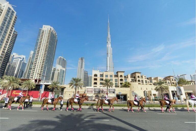 Pink Caravan Equestrian Brigade strides through Dubai streets